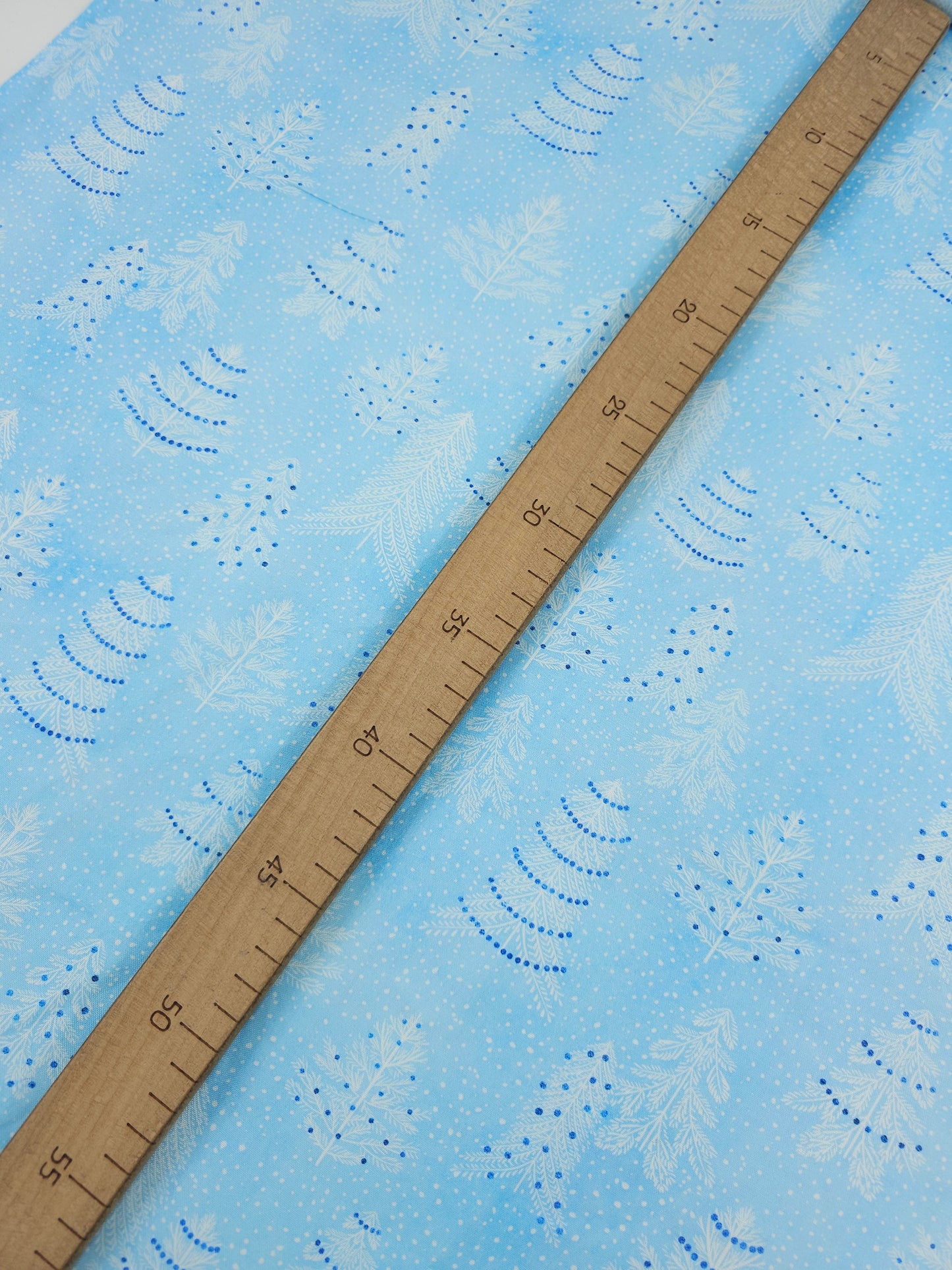 Light Blue Snowy Christmas Trees 100% Cotton - Robert Kaufman