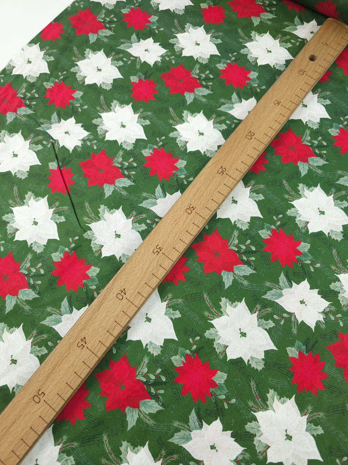 Red/White Musical Poinsettia Floral 100% Cotton