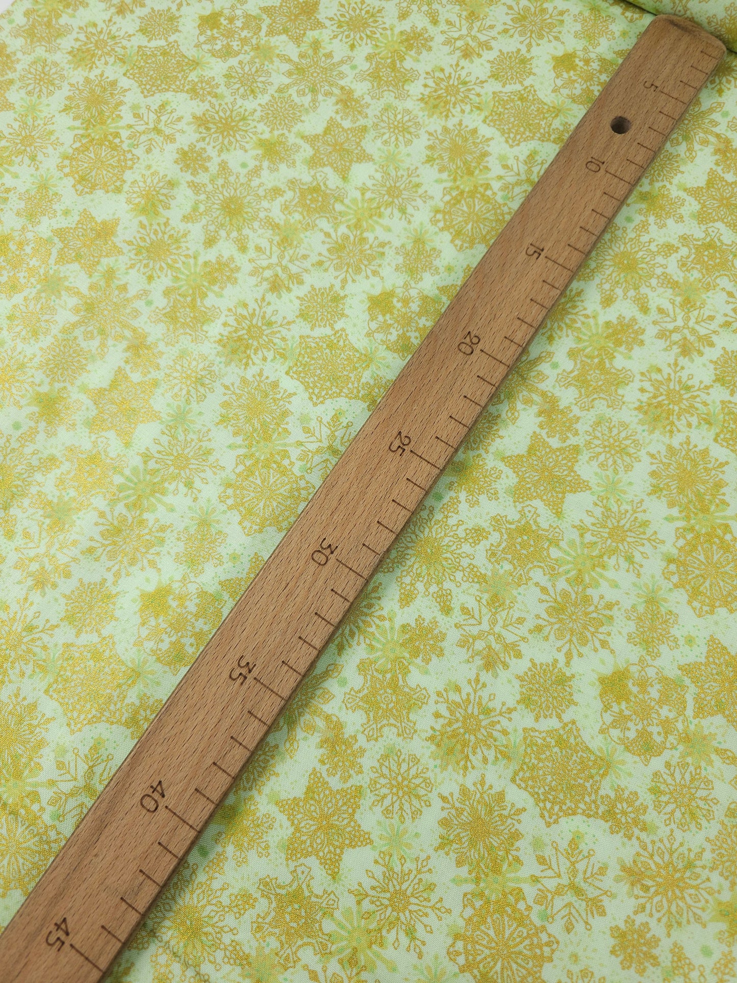 Lime/Gold Snowflakes 100% Cotton - Robert Kaufman