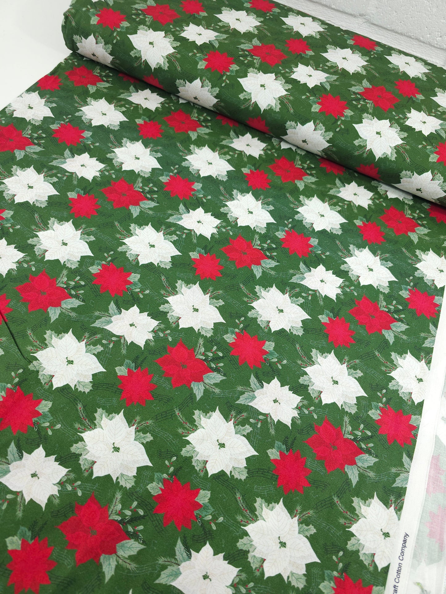 Red/White Musical Poinsettia Floral 100% Cotton