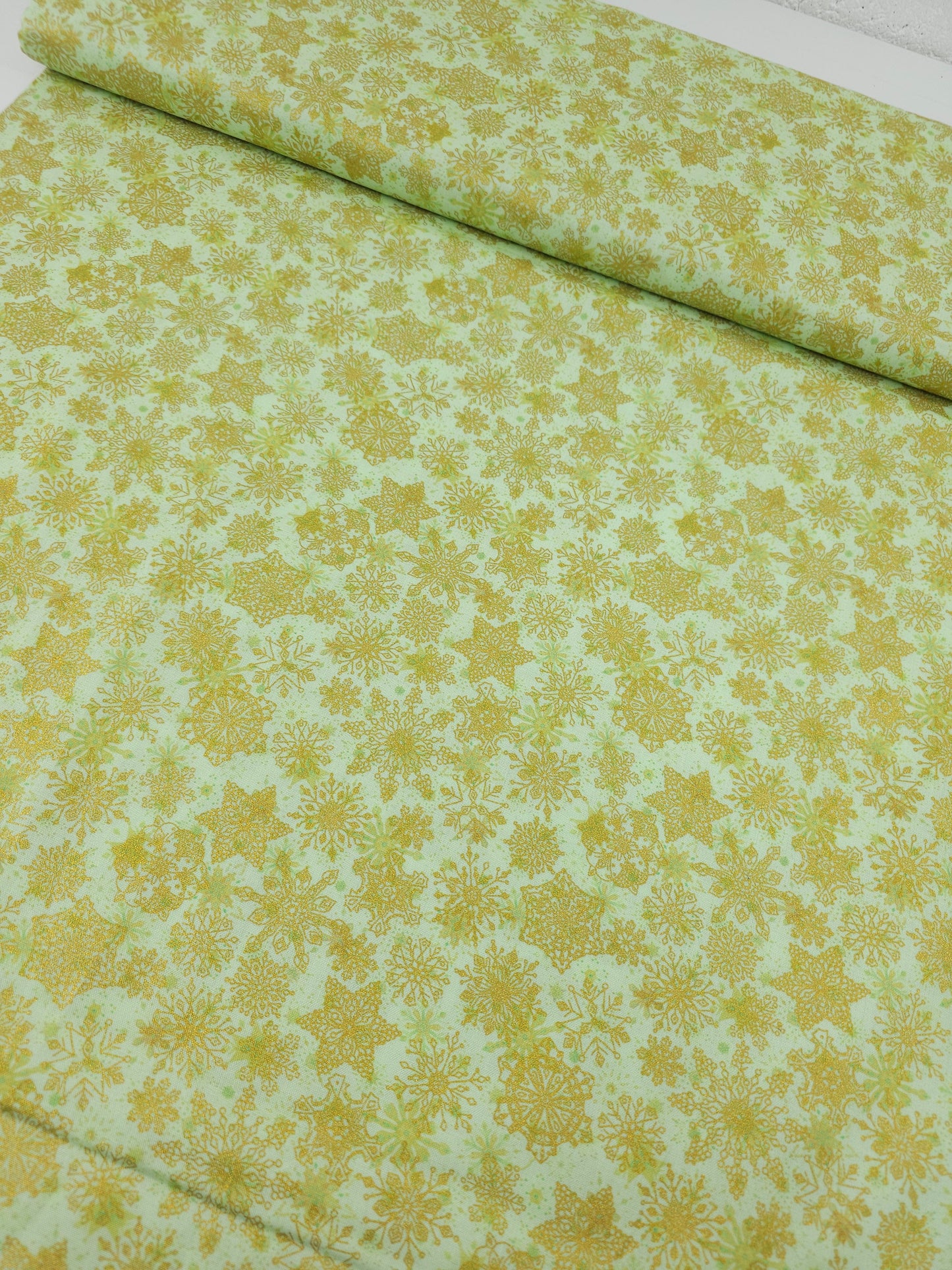 Lime/Gold Snowflakes 100% Cotton - Robert Kaufman